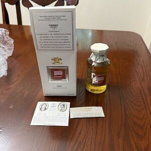 Creed Fragrance Information Card with Gold Accents